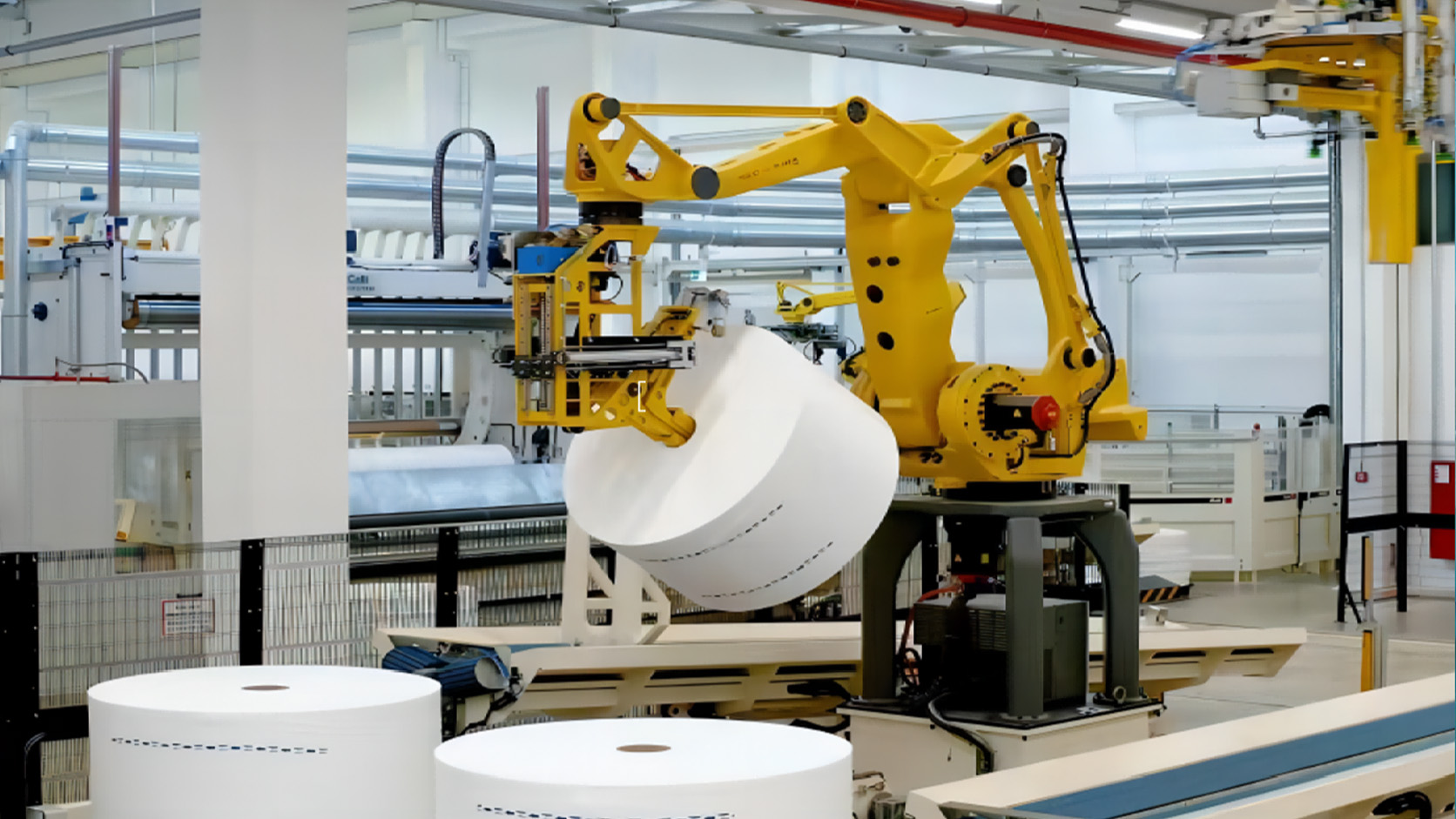 Sanqi quality team reviewing protective materials in a controlled production area
